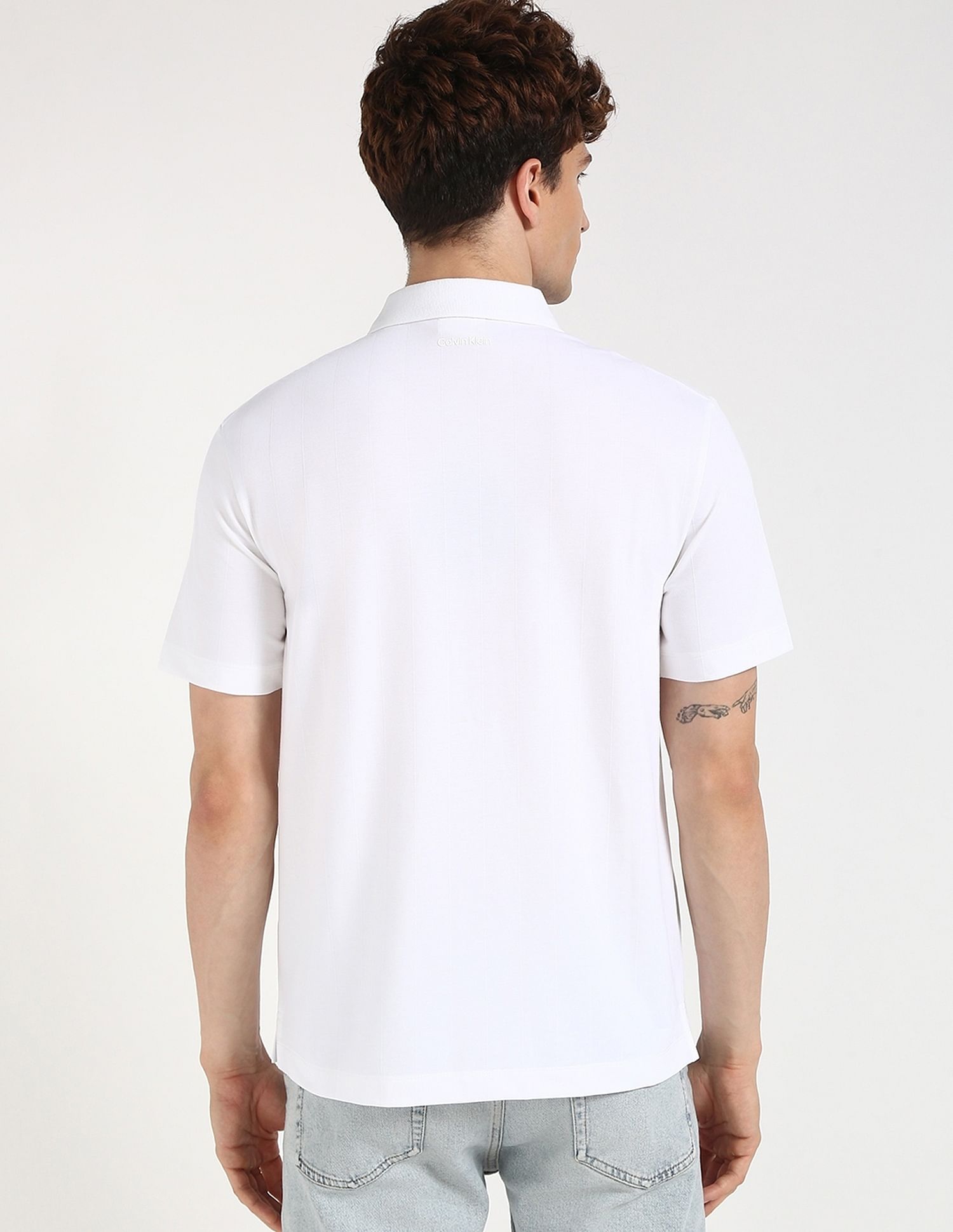 Calvin Klein Jeans Self Design Regular-Fit Polyester Polo T-Shirt