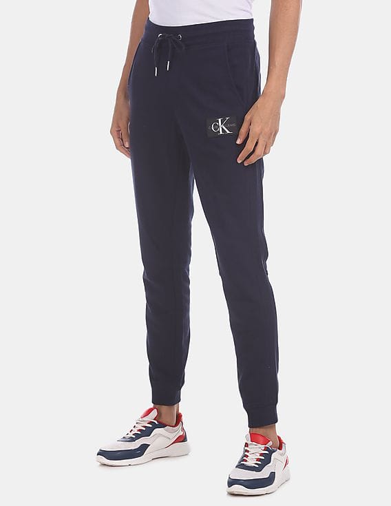 Buy Calvin Klein Men Navy Slim Fit Monogram Patch Panelled Joggers -  NNNOW.com