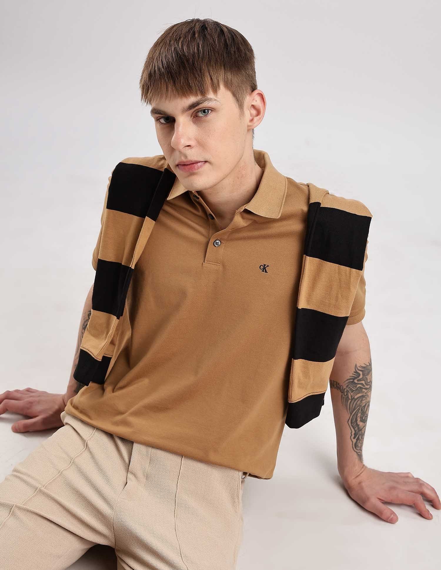 Calvin Klein Jeans Mens Brown Solid Polo Shirts