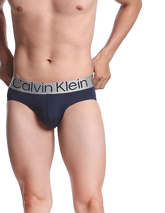 Buy Calvin Klein Underwear Men White Contrast Waistband Solid Hip Briefs -  NNNOW.com