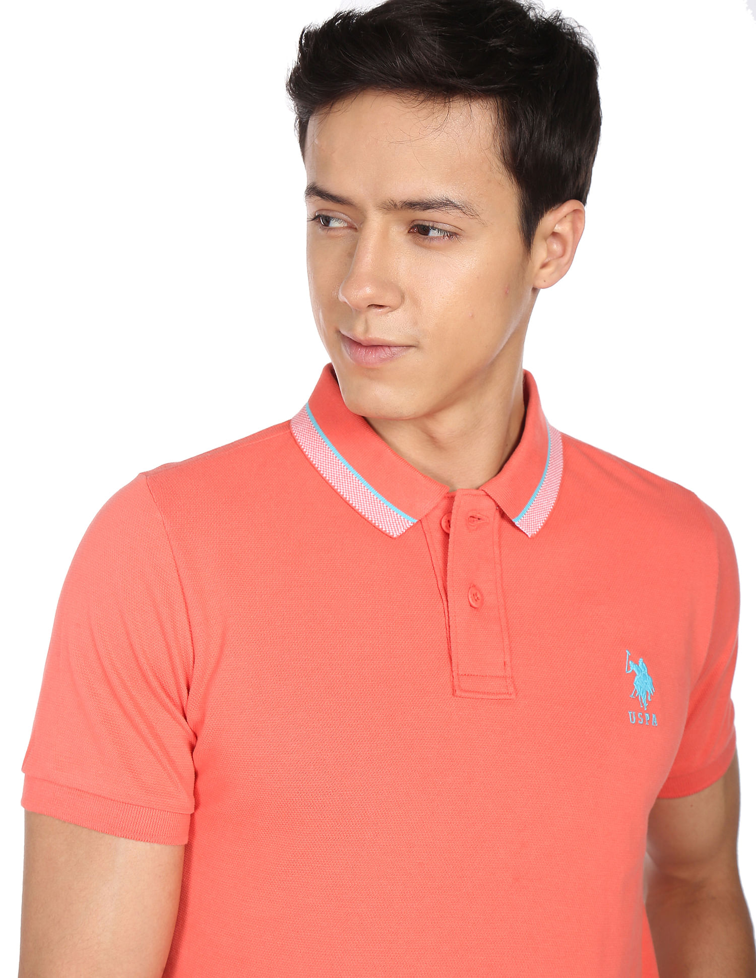 coral polo shirt