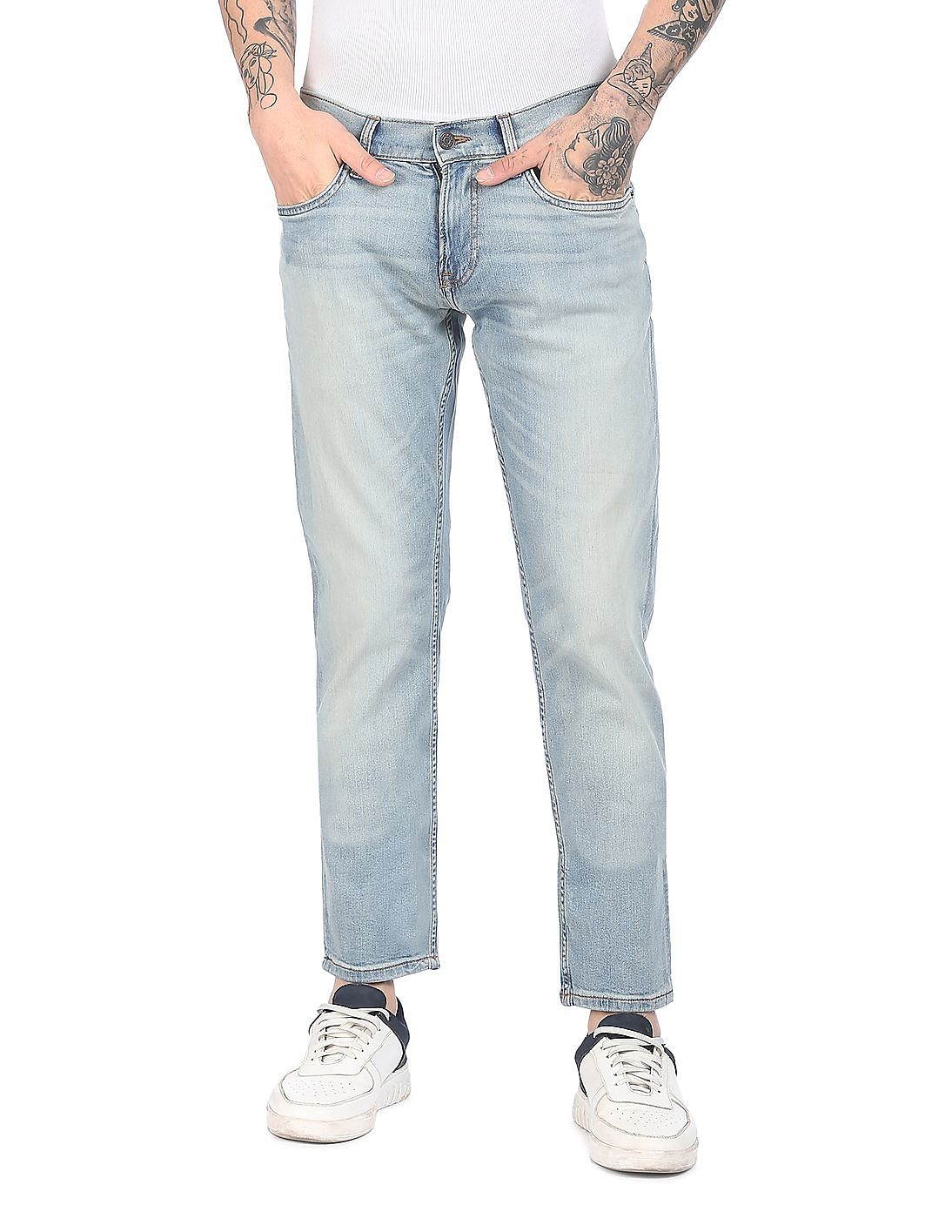 Buy Tommy Hilfiger Men Light Blue Mid Rise Scanton Slim Fit Jeans ...