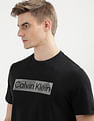 Calvin Klein Knockout Logo Graphic Print T-Shirt
