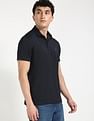 Tommy Hilfiger Solid Regular-Fit Cotton Polo Shirt