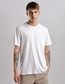 Calvin Klein Jeans Mens White Solid T-Shirts