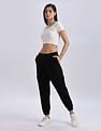 Calvin Klein Jeans Regular-Fit Solid Mid Rise Joggers